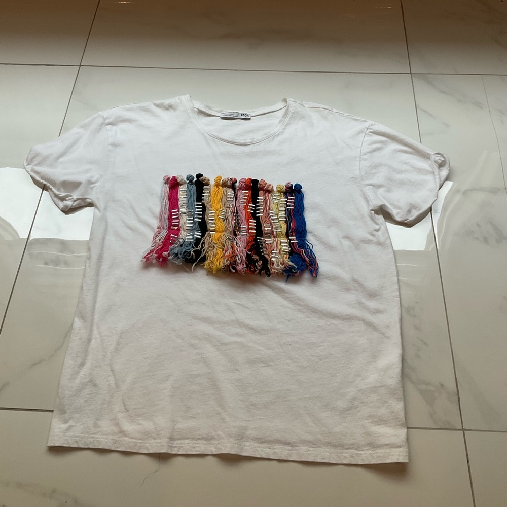 Zara shirt with yarn design.